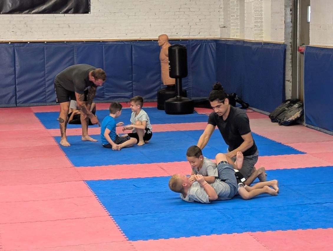 DeKalb County BJJ training facility with students on mat