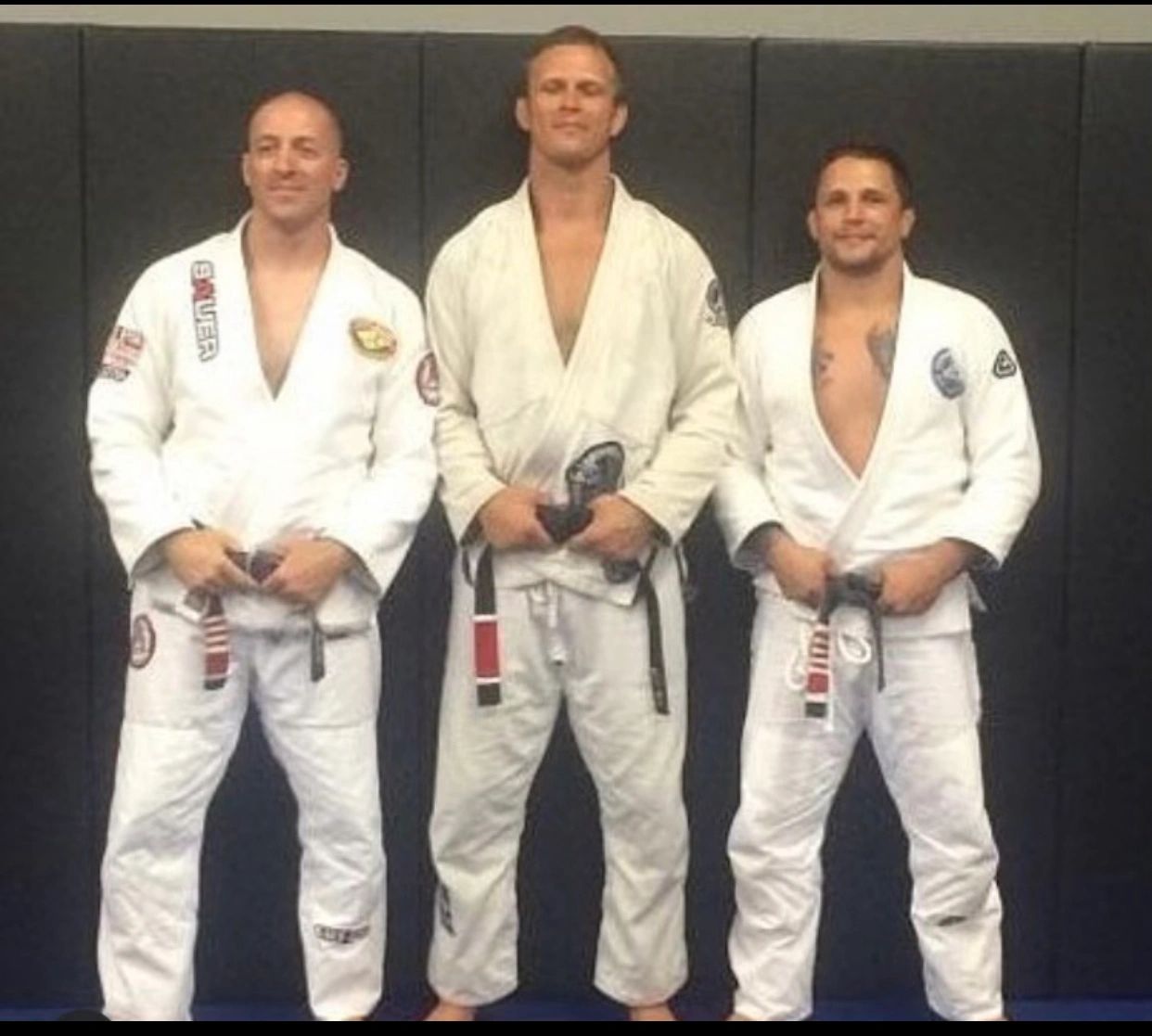 Three martial artists white gis